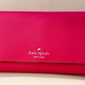 Kate Spade Tri-fold wallet. NWOT. Fuschia leather.